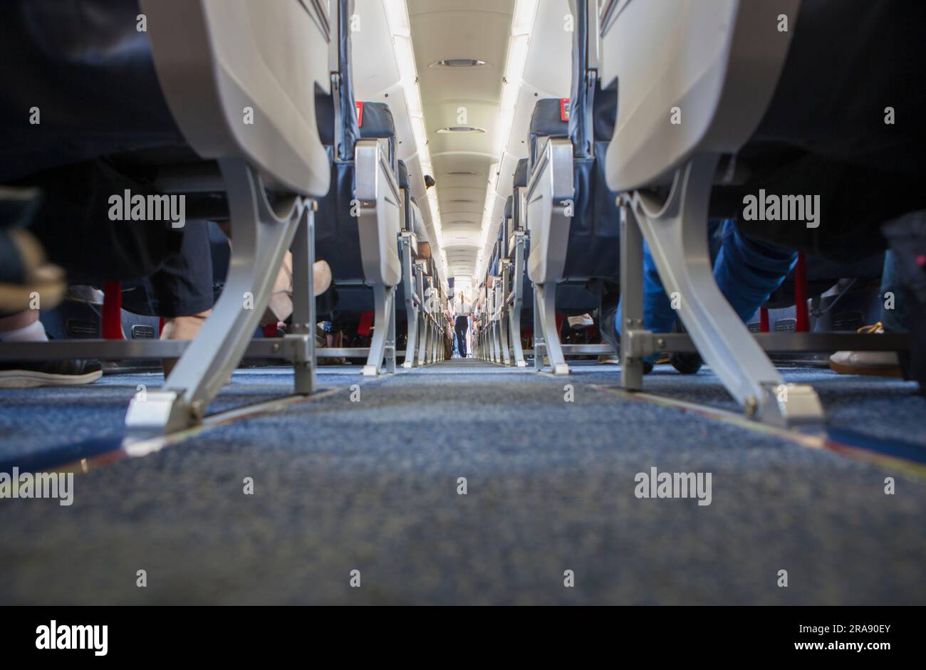 Normal class passenger jet airliner corridor. Ground view Stock Photo