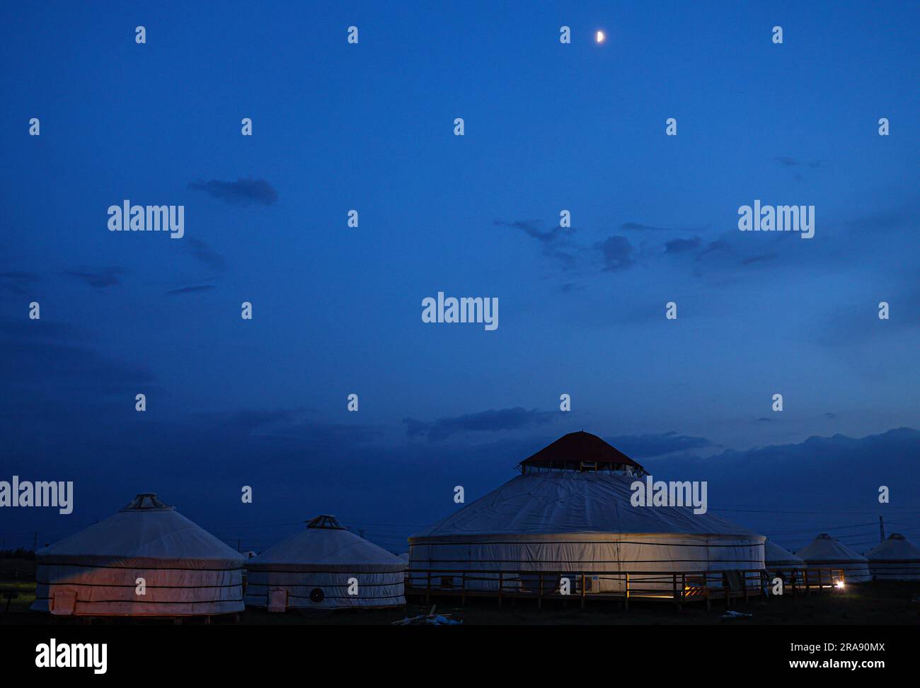 Hulun Buir. 26th June, 2023. This photo taken on June 26, 2023 shows yurts on the grassland in Hulun Buir, north China's Inner Mongolia Autonomous Region. Credit: Lan Hongguang/Xinhua/Alamy Live News Stock Photo
