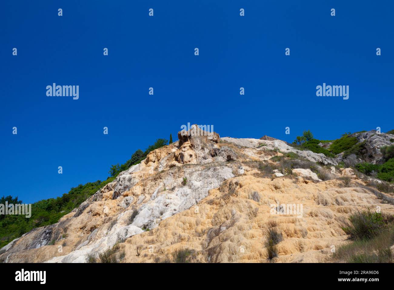 Picturesque Hilltop Setting Enhancing the Natural Charm of Bagno Vignoni's Baths Stock Photo