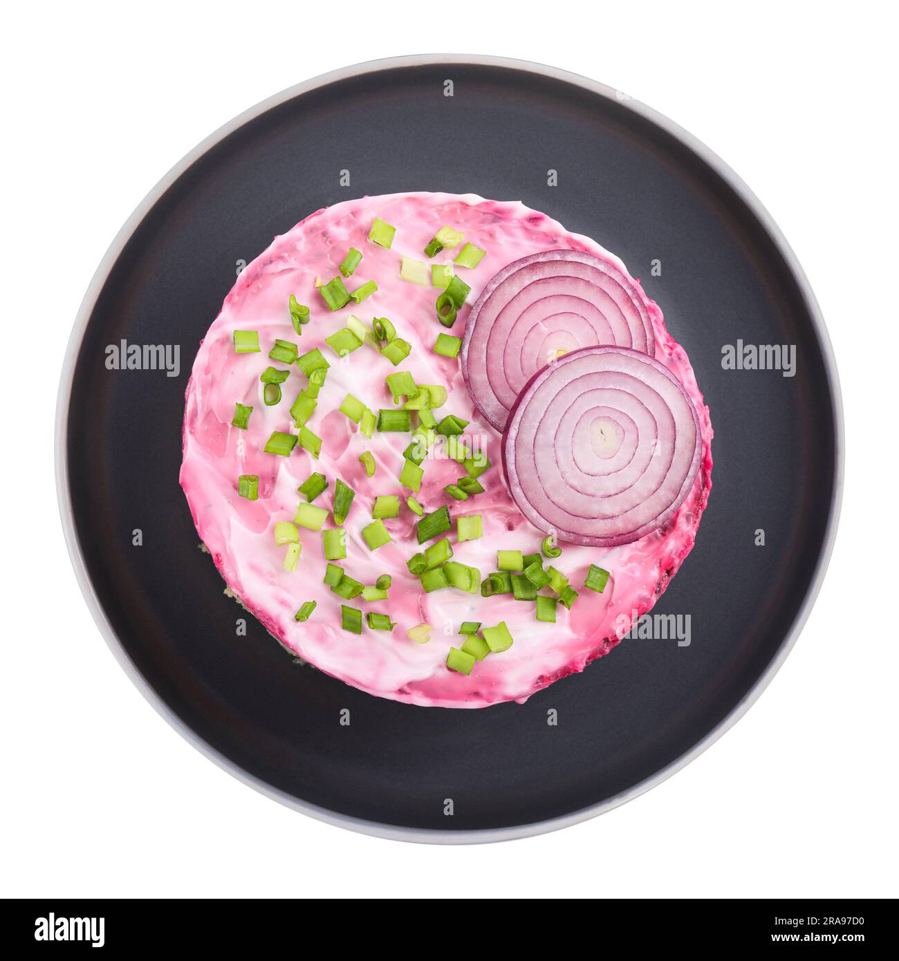 Herring under fur coat salad isolated on white, top view. Traditional