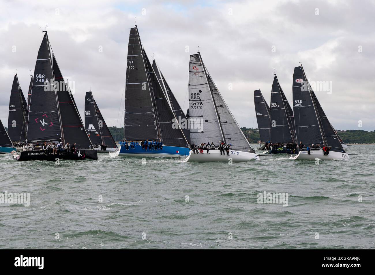It's an immpressive sight when all the sailboats line up for the start of the Isle of Wight Round The Island Yacht Race Stock Photo