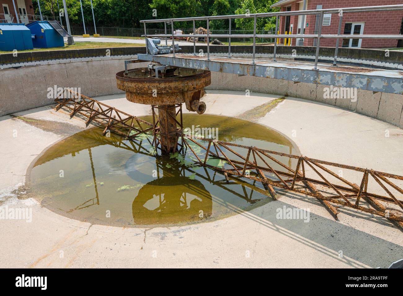 Emptied and dry waste water treatment tank being cleaned as part of