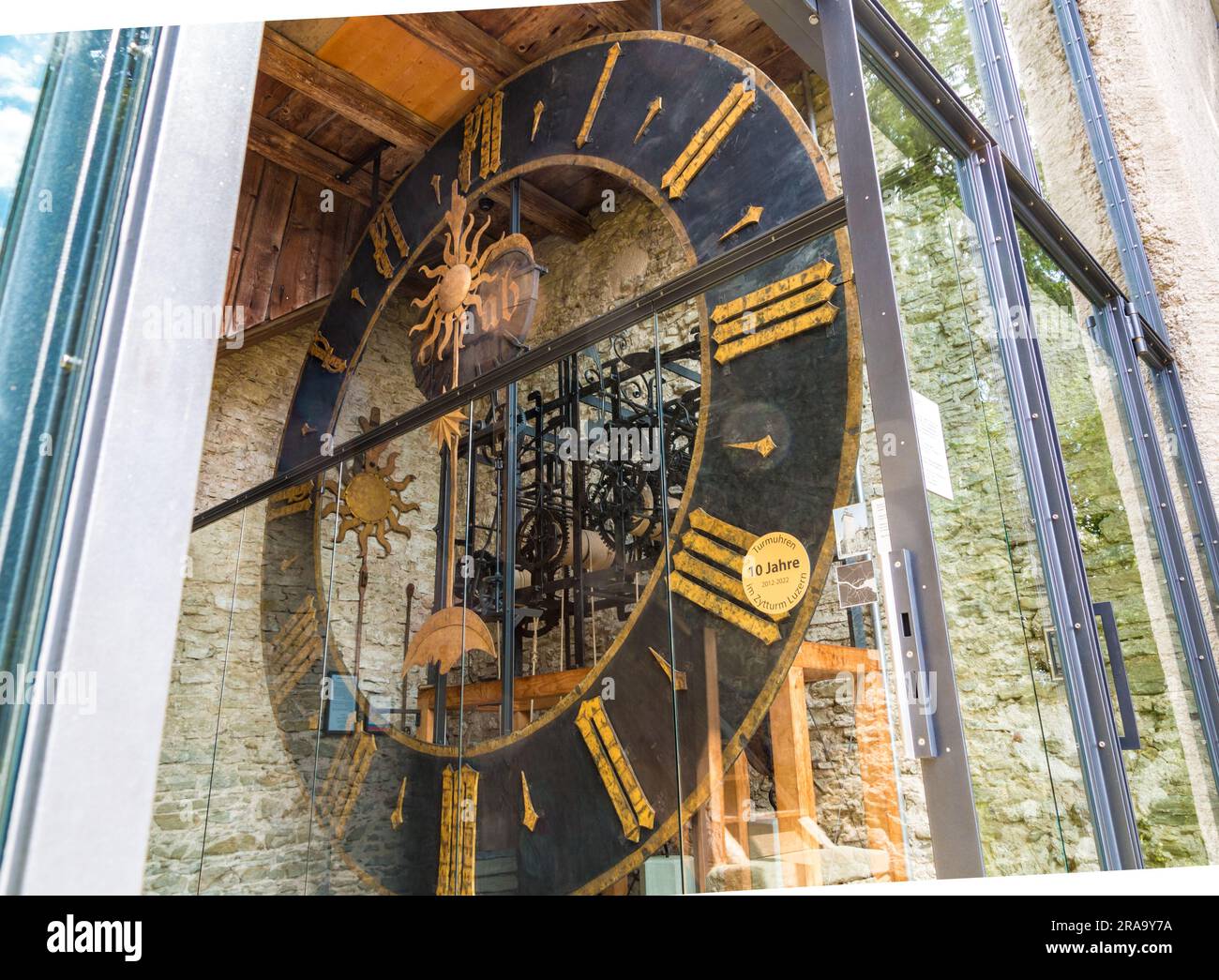 Great close-up view of the Lucerne's Town Hall clock with a large dial constructed in 1526. It is now displayed in the Zytturm (Time Tower) which is... Stock Photo