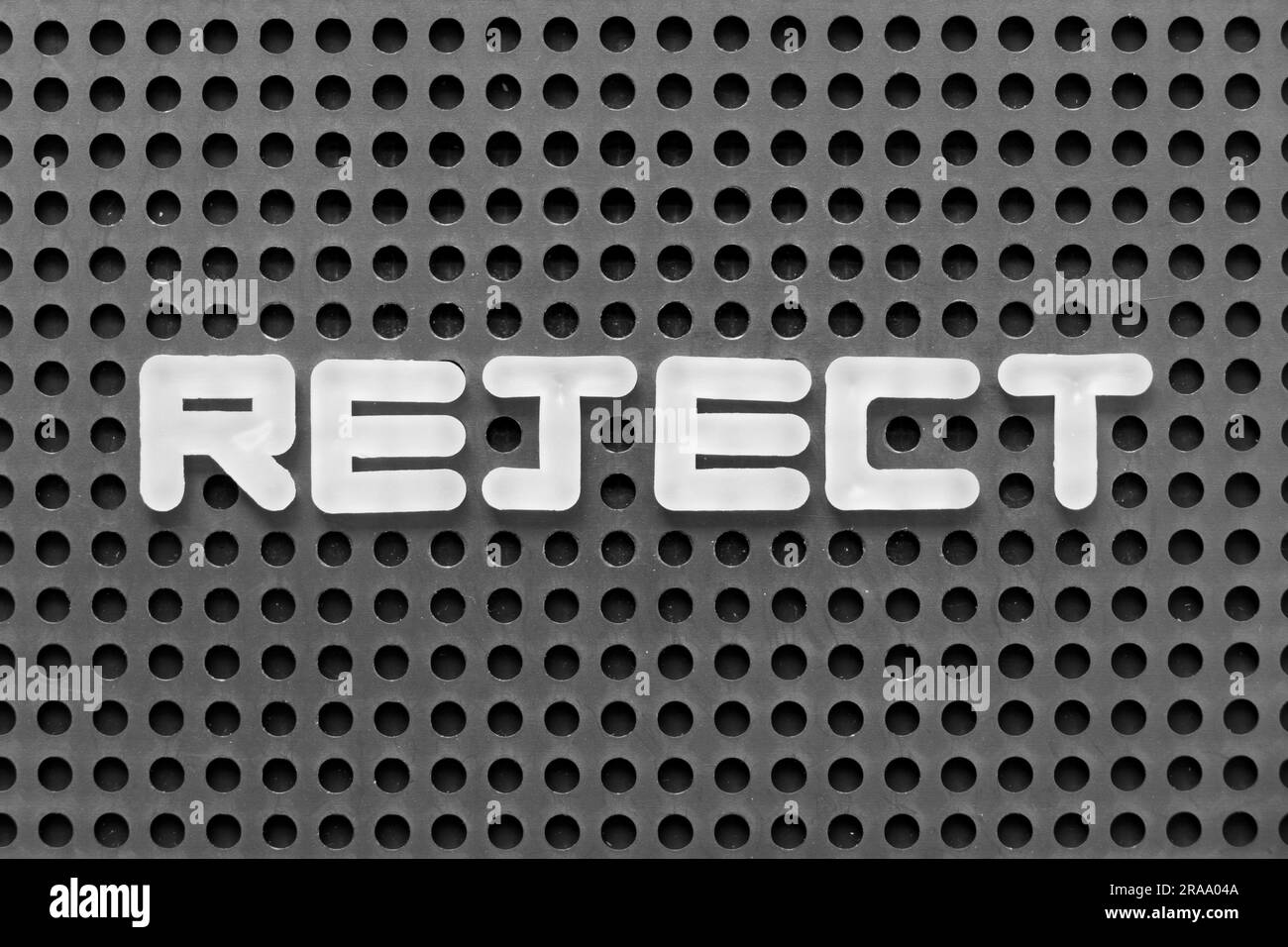 White Alphabet Letter In Word Reject On Black Pegboard Background Stock Photo Alamy