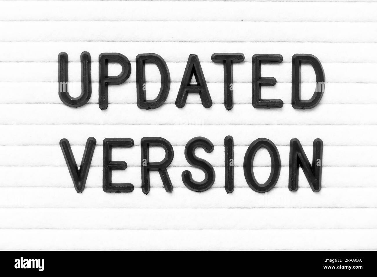 Black color letter in word updated version on white felt board ...