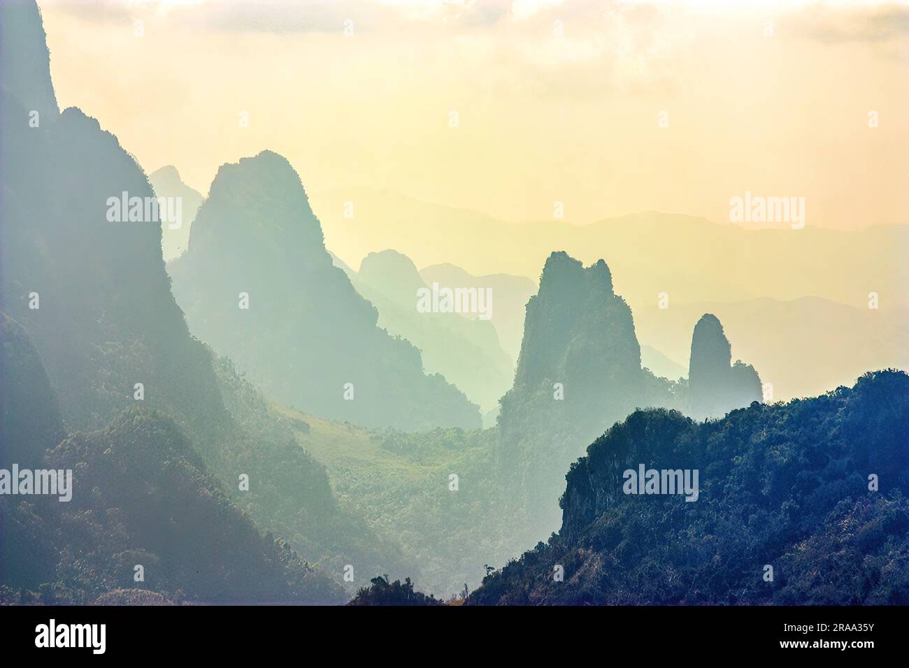 Misty hills in Laos Stock Photo - Alamy