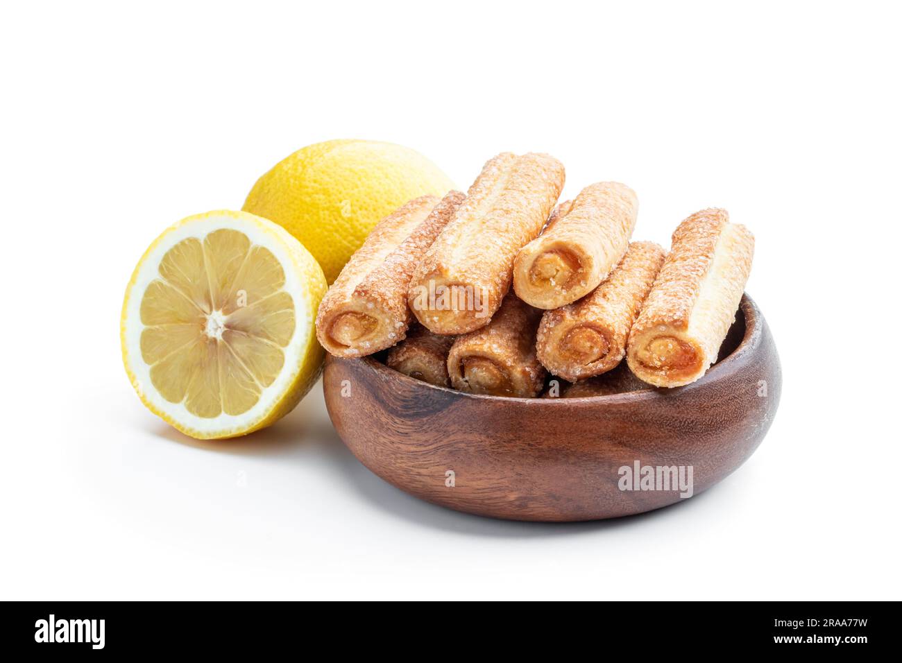 Homemade  lemon jam filled sticks in wooden bowl isolated on white Stock Photo