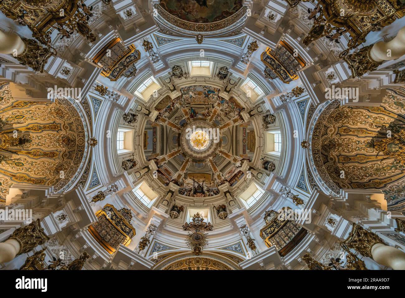 Seville, Spain - June 16, 2023 : Interior wide angle view of Dome and ceilling of baroque style Church of San Luis de los Franceses. Stock Photo