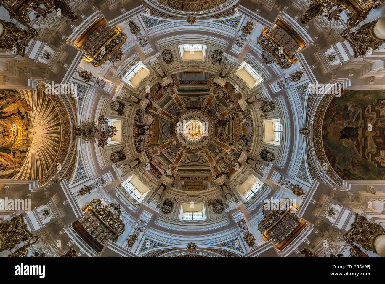 Seville, Spain - June 16, 2023 : Interior wide angle view of Dome and ceilling of baroque style Church of San Luis de los Franceses. Stock Photo