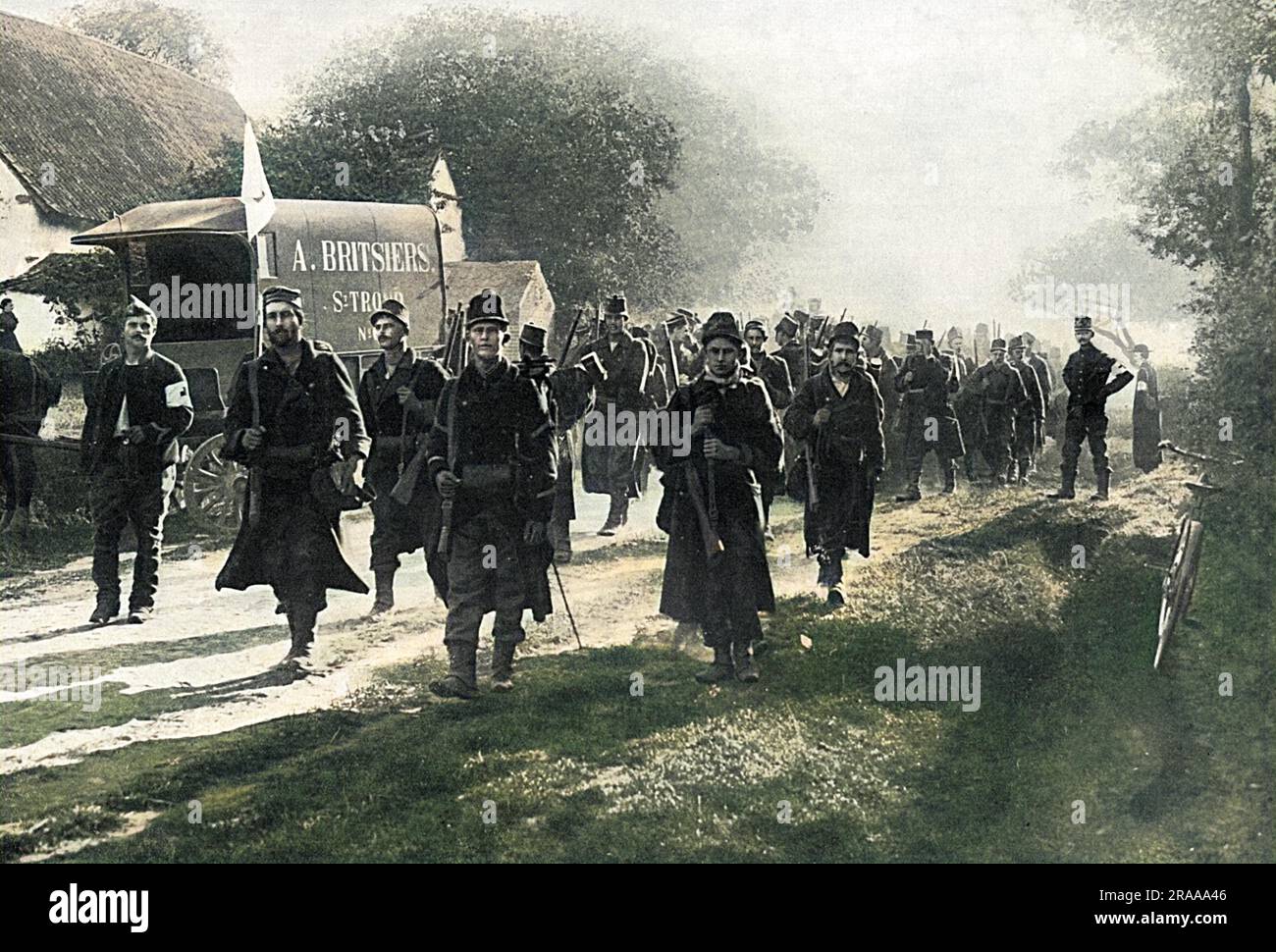 When Belgium was invaded at the start of World War I, it was lacking in fighting men, equipment and officers with experience of war. She had 110,000 men, exclusive of the garrisons at Liege and Namur, to guard the road to Brussels. These men, however, proceeded to the firing line, as seen in this photograph, with determination and eagerness.     Date: 1914 Stock Photo