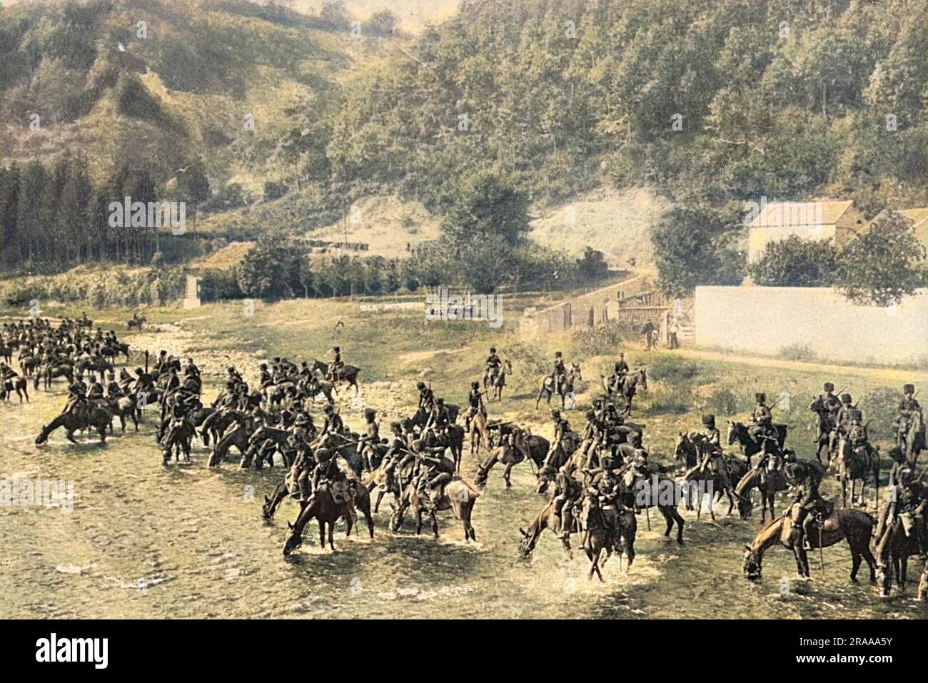 A regiment of the Belgian cavalry watering their horses in the early morning.     Date: 1914 Stock Photo
