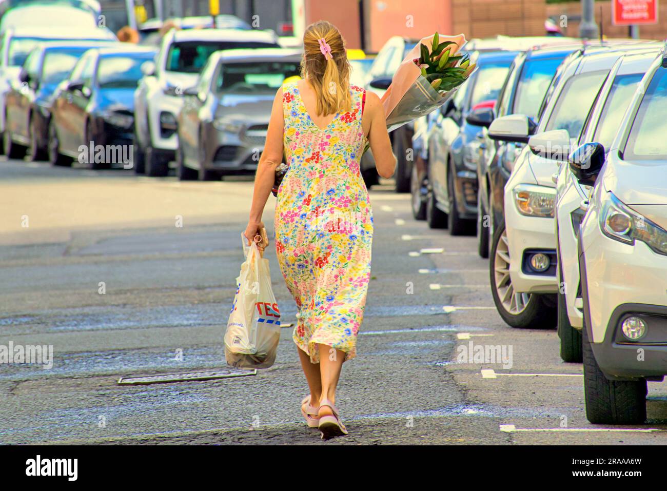 Glasgow, Scotland, UK 2nd  July, 2023. UK Weather:  Mild after a warm clammy day saw locals and tourists take to the streets. The walk of shame. Credit Gerard Ferry/Alamy Live News Stock Photo