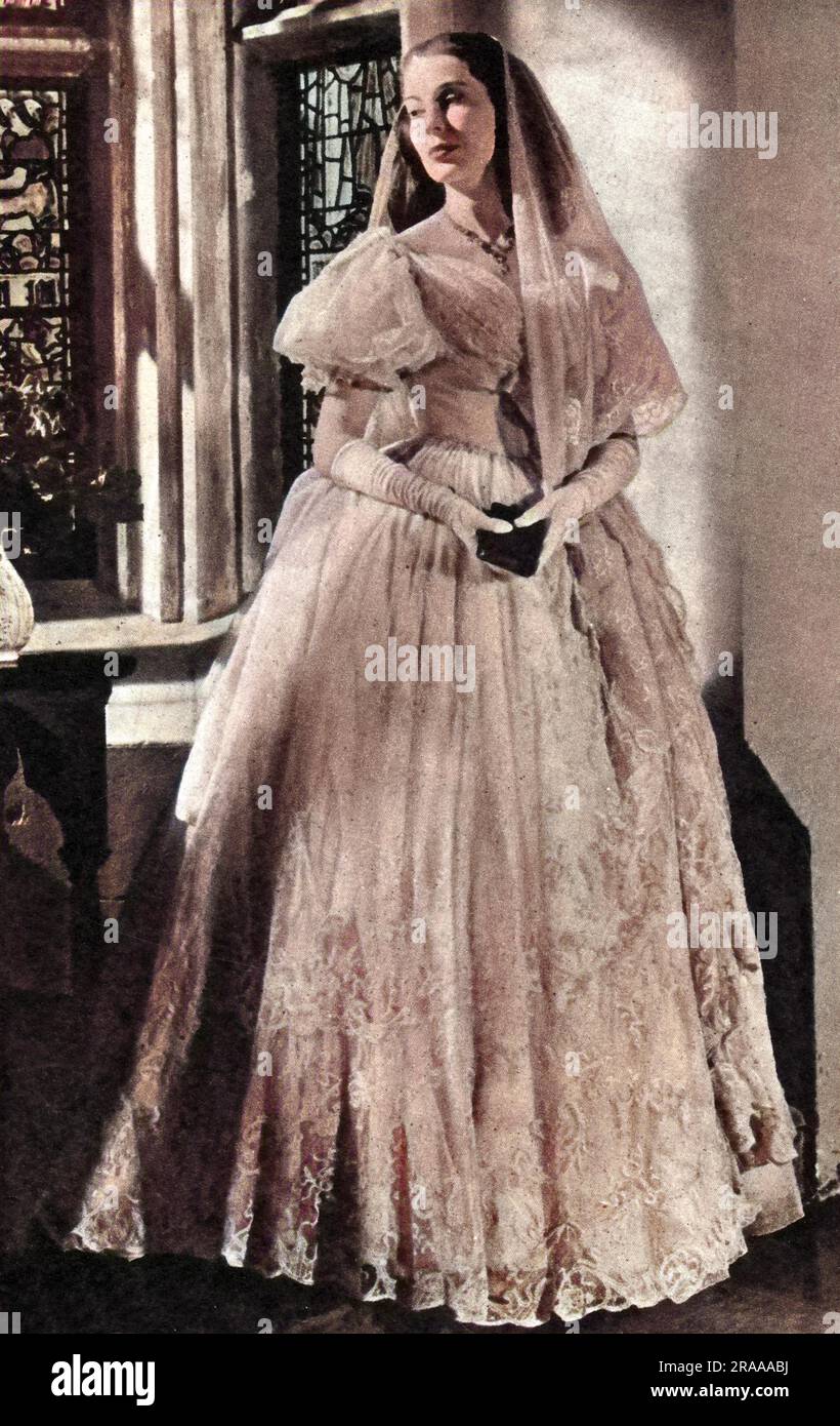 A photograph taken from a fashion feature in Britannia and Eve magazine showing the latest style in wedding dresses.     Date: 01/06/1947 Stock Photo