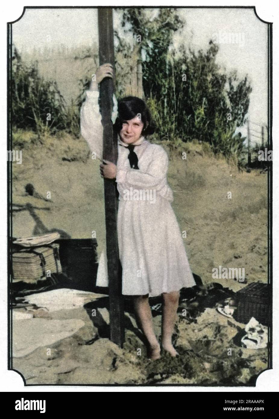 Photograph of the Duchess of Kent, formerly Princess Marina of Greece (1906-1968), daughter of Princess Helen of Russia and Prince Nicholas of Greece, and wife of Prince George, Duke of Kent.  Taken on the beach at Athens, where, during this period, according to the friend who supplied this photograph to The Tatler, the Princess's family took tea on the beach each afternoon.   Princess Marina is the mother of the current Duke of Kent, Princess Alexandra and Prince Michael of Kent.     Date: 1915 Stock Photo