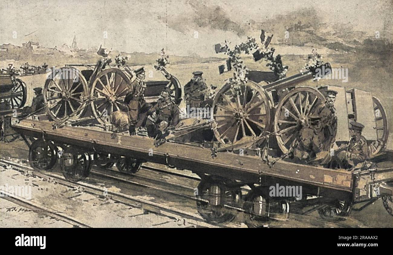 At Boulogne British artillery pieces, loaded on a train to be taken to the front, have been decorated with flags and flowers by the local people.     Date: Aug-14 Stock Photo