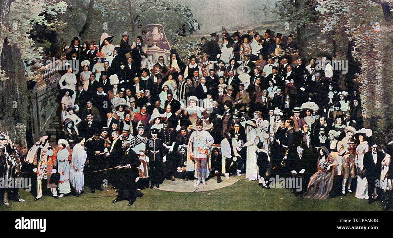 The dress rehearsal for the first Royal Variety Show performance at the Palace Theatre, 1912, which was attended by many celebrities. This photograph shows 'Variety's Garden Party', in which 150 members of the cast sang 'God Save the King' at the close of the programme. In the centre is Harry Claff as the White Knight, who sang the solo part of the National Anthem. Just to his right is seated G.H Chirgwin, and a little to left, Miss Vesta Tilley in military uniform. Amongst other well known performers taking part in the tableau are Miss Victoria Monks, Miss Peggy Pryde, Miss Vesta Victoria, Mr Stock Photo