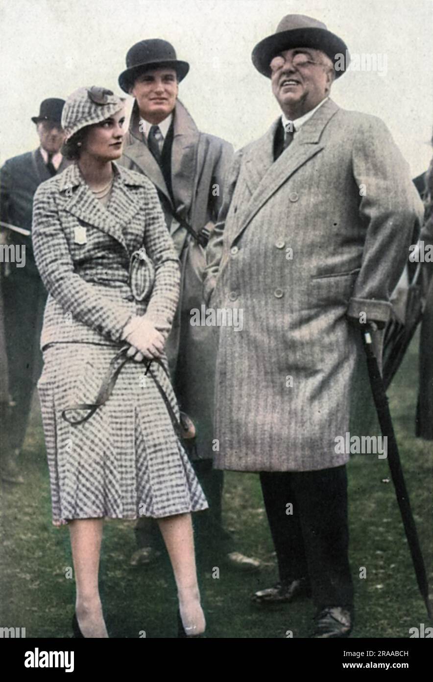 Miss Margaret Whigham (1912-1993), later Mrs Charles Sweeny and then Margaret Campbell, Duchess of Argyll, pictured in 1931 at the autumn race meeting at Newbury with H.H. The Prince Aga Khan, who had seven horses running at the meeting.  The Aga Khan's son, Prince Aly Khan, had fallen in love with Margaret in the previous year, but the romance was discouraged by her parents.     Date: 1931 Stock Photo