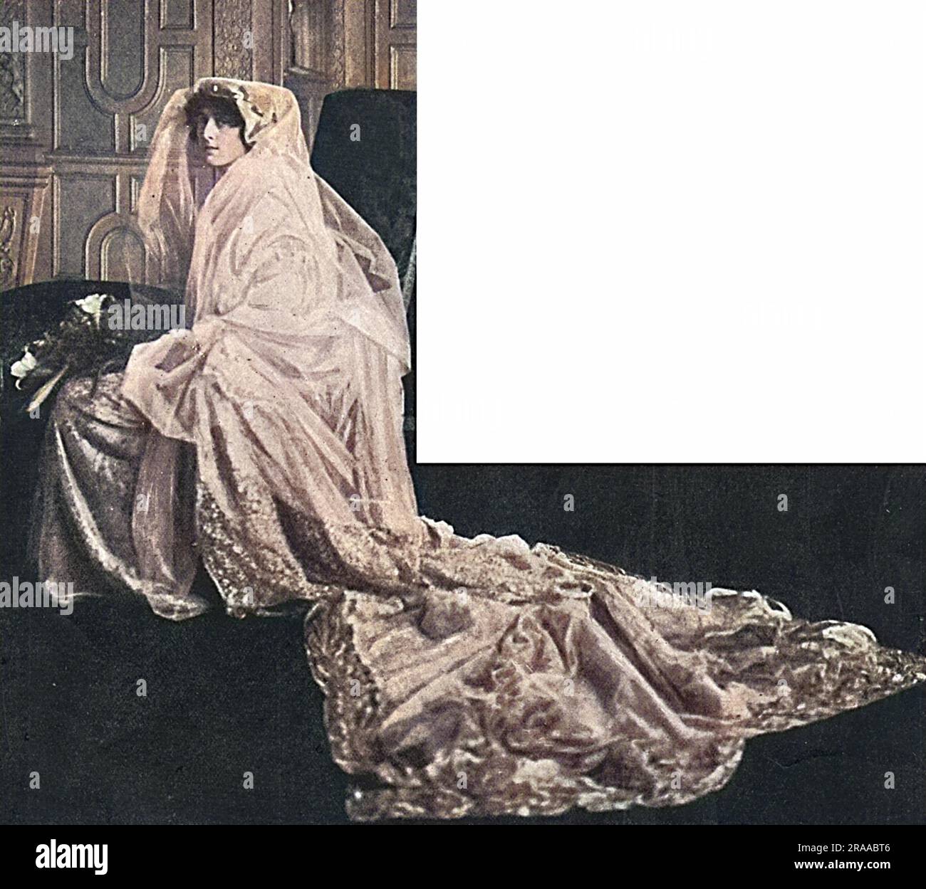Vita Sackville-West in her fine cloth-of-gold wedding dress on the day of  her marriage at Knole Park to diplomat Harold Nicolson. The dress was  designed by Lady Sackville, the bride's mother. Date: