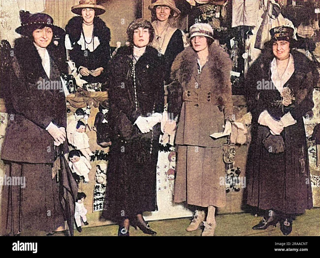Ladies pose by the stall run by actress Miss Lily Elsie (Mrs Ian Bullough) at the Albert Hall in aid of the funds of St. Dunstan's Hostel for blinded soldiers, a charity founded and run by Sir Arthur Pearson.  The bazaar was opened by Queen Alexandra on 7th May 1917 and ran until the 10th.  Sir Arthur Pearson in a speech on the occasion explained the After-Care scheme, which was designed to rehabilitate and forward the interests of those who passed through St. Dunstan's as well as those still there learning trades.  Photograph shows, from left (back row) Miss Gill and Miss Glyn and in the fron Stock Photo