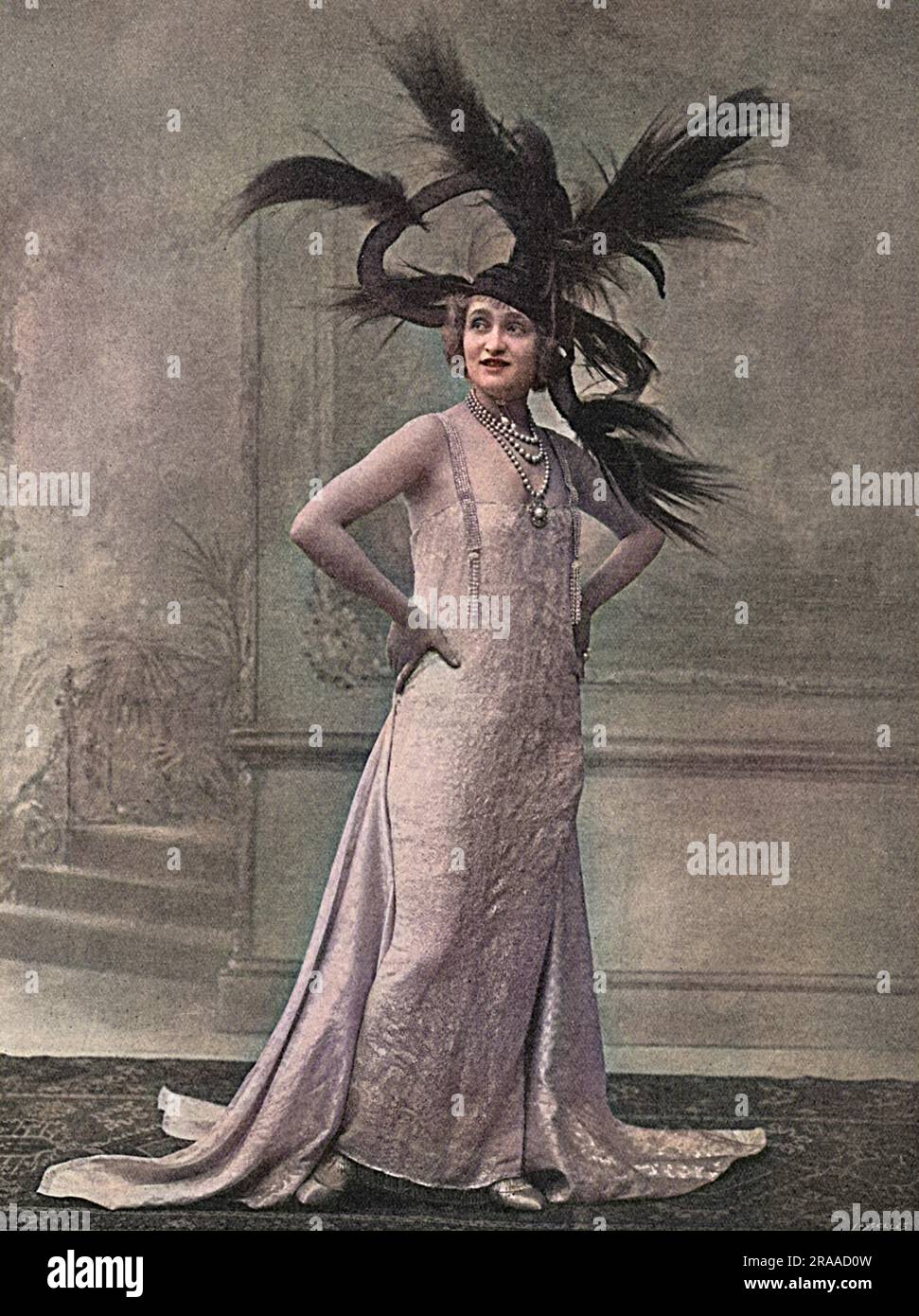 Gaby Deslys (1884 - 1920), French actress, music hall artiste and sometime lover of King Manuel II of Portugal, pictured in 1915 when she was appearing in '5064 Gerrard.'  Known for her magnificent stage costumes, she is wearing a particularly flamboyant headdress.     Date: 1915 Stock Photo