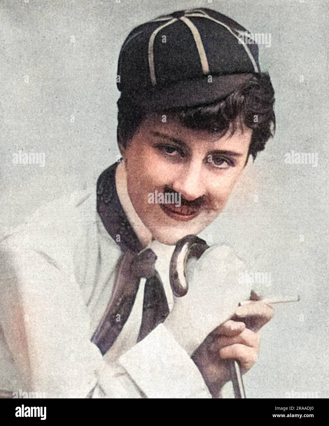 Beatrice Lillie (1894 - 1989) British actress, later Lady Peel after she married Robert ('Bobbie') Peel, who succeeded to his father's baronetcy in 1925.  Pictured early in her career dressed up as Charlie Chaplin, the 'Cinema King' in the new Vaudeville revue, Tabs.     Date: 1918 Stock Photo