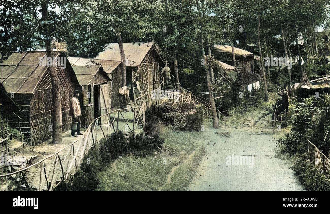 Some very rustic but well made huts constructed by artillery men from Landes, near the Aisne.  The buildings were in the style of those from their own locality in South West France.     Date: 1915 Stock Photo