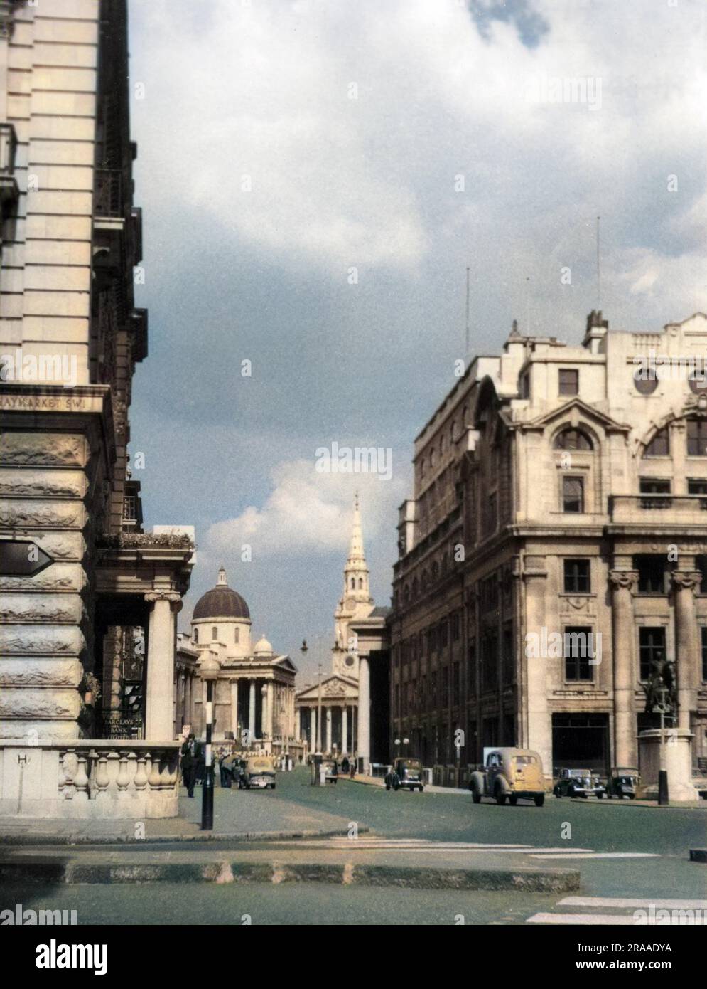 Pall Mall, with the National Gallery and St. Martin's Church beyond, viewed from the corner with Haymarket, London, England.     Date: 1950s Stock Photo