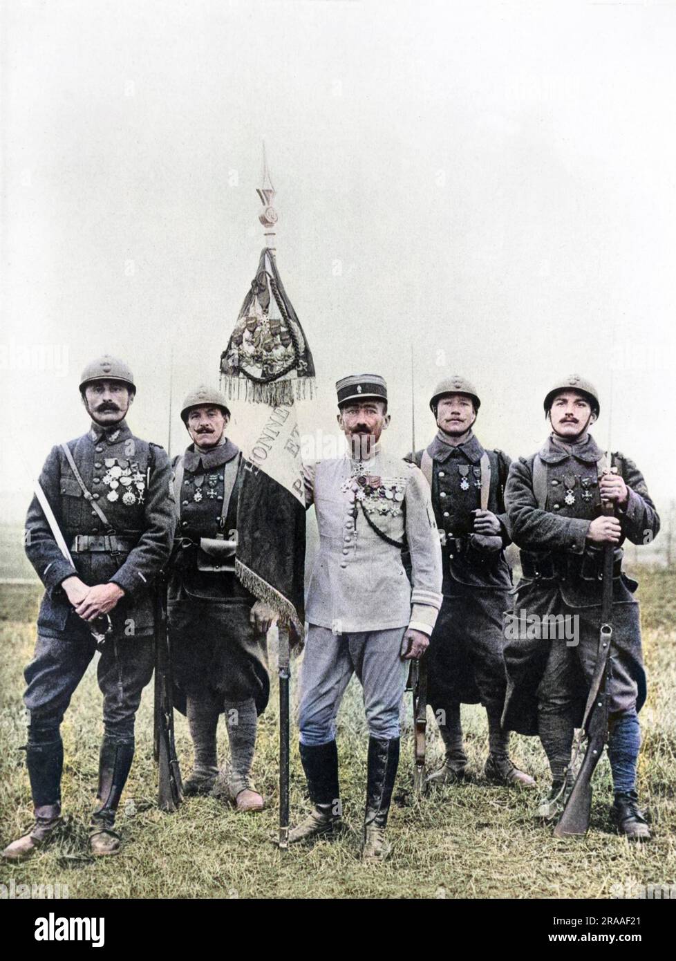 Lieutenant-Colonel Paul-Frederic Rollet (1875-1941), General in the French Foreign Legion, Regiment de Marche.  Seen here during the First World War, probably at Verdun, northern France, with four others, where the RMLE (Regiment de Marche de la Legion Etrangere) won the legion d'honneur for its regimental flag.  Rollet was a legendary figure, known as Le Pere Legion.     Date: circa 1917 Stock Photo