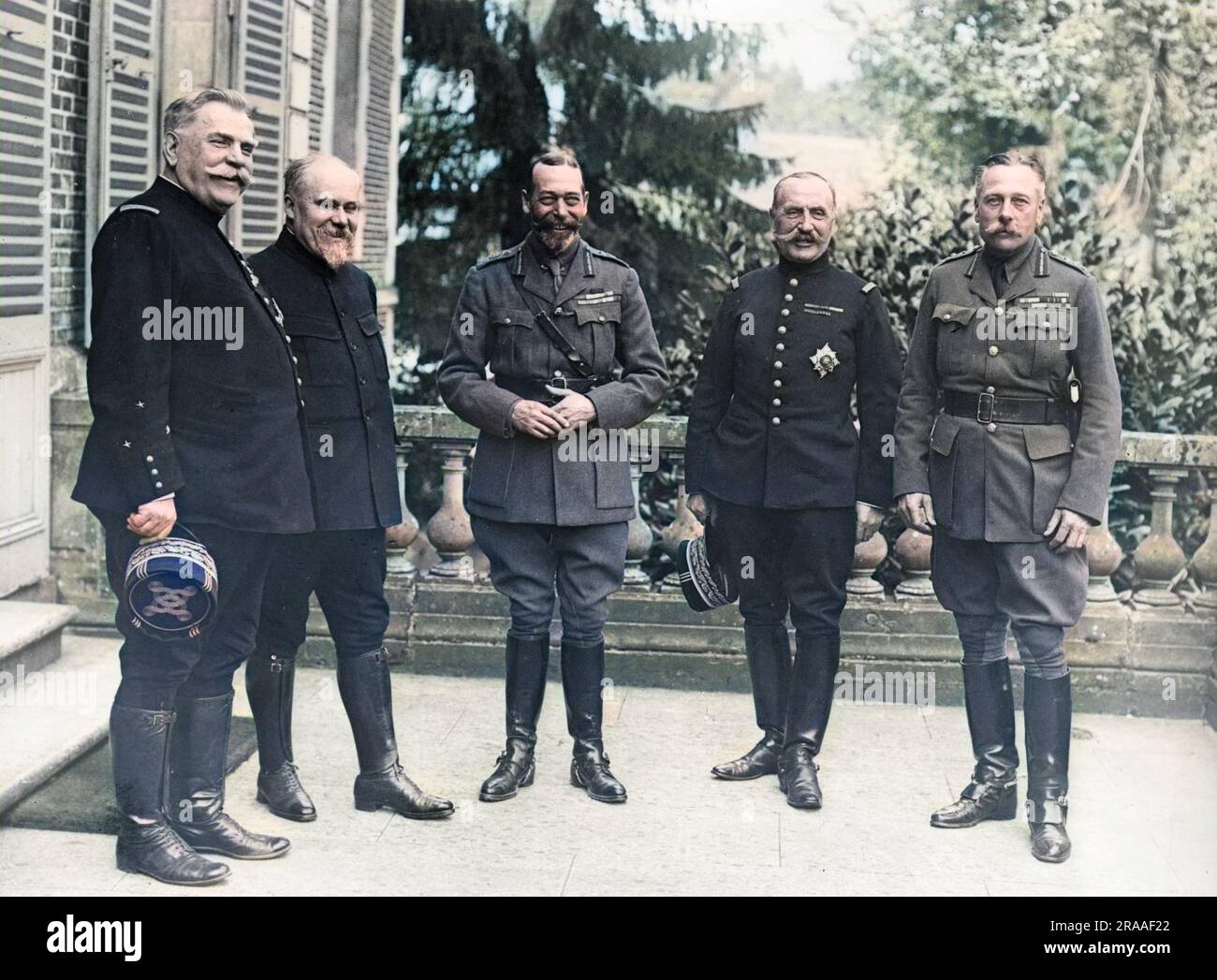 King George V in army uniform with British and French military leaders during the First World War.  They are standing outside General Joffre's chateau at Beauquesne in northern France, where they had met to discuss the results of the Somme offensive.  From left to right they are General Joffre, President Poincare, George V, General Foch and General Sir Douglas Haig.     Date: Aug-18 Stock Photo