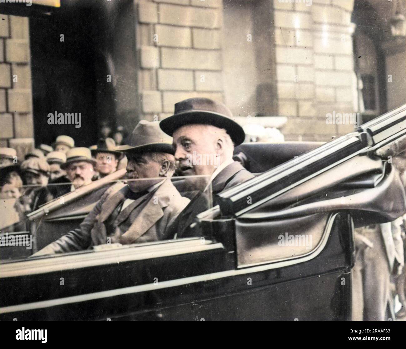 David Lloyd George (left), British Prime Minister, and Arthur James Balfour (right), British Foreign Secretary, riding in an open topped car, leaving the Hotel Crillon in Paris where they had been attending a wartime conference.     Date: 26-Jul-17 Stock Photo