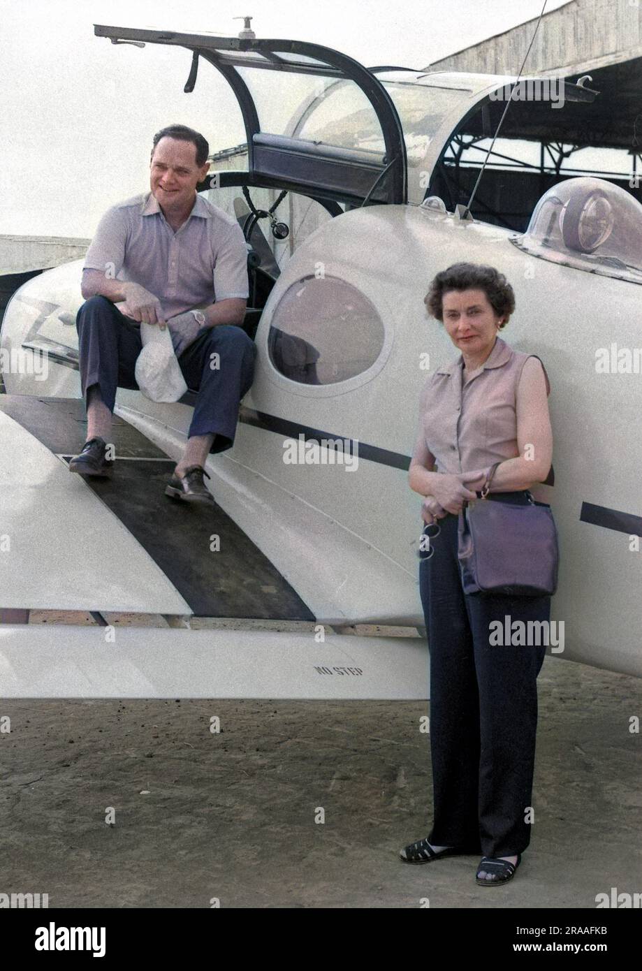 Douglas Bader (1910-1982) RAF fighter ace, pictured with his wife and a light aircraft at Lungi Airport, Sierra Leone, West Africa.     Date: late 1950s Stock Photo