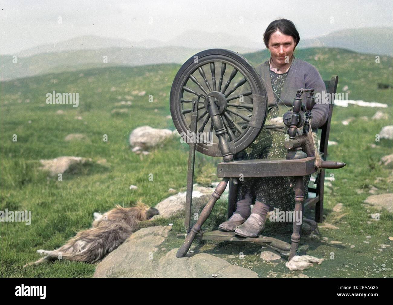 Old woman spinning wheel hi-res stock photography and images - Alamy