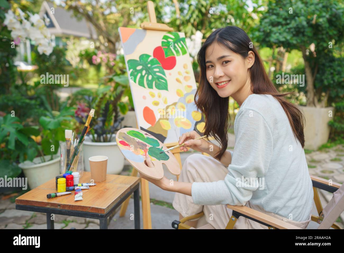 Creative art concept, Female artist holding brush and color palette to ...