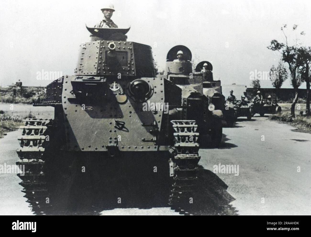 Japanese tanks and armoured vehicles on the road to Nanking.     Date: 1937 Stock Photo