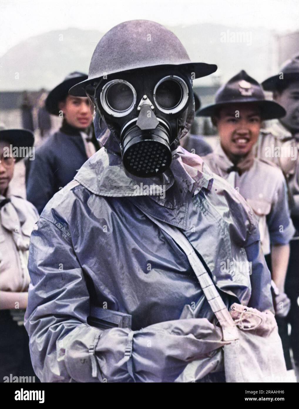 A Chinese man wearing a gas mask during the Sino-Japanese War. Toxic gas was used frequently by Japanese forces during the war.     Date: 1940 Stock Photo