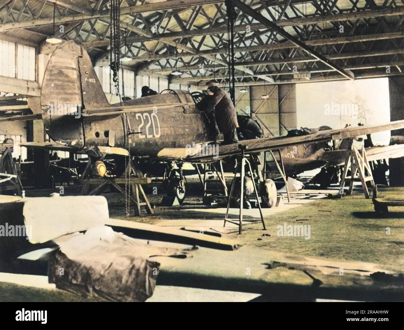 Repaired Hanger In a repair hangar somewhere in China, skilled Chinese workers repair ...