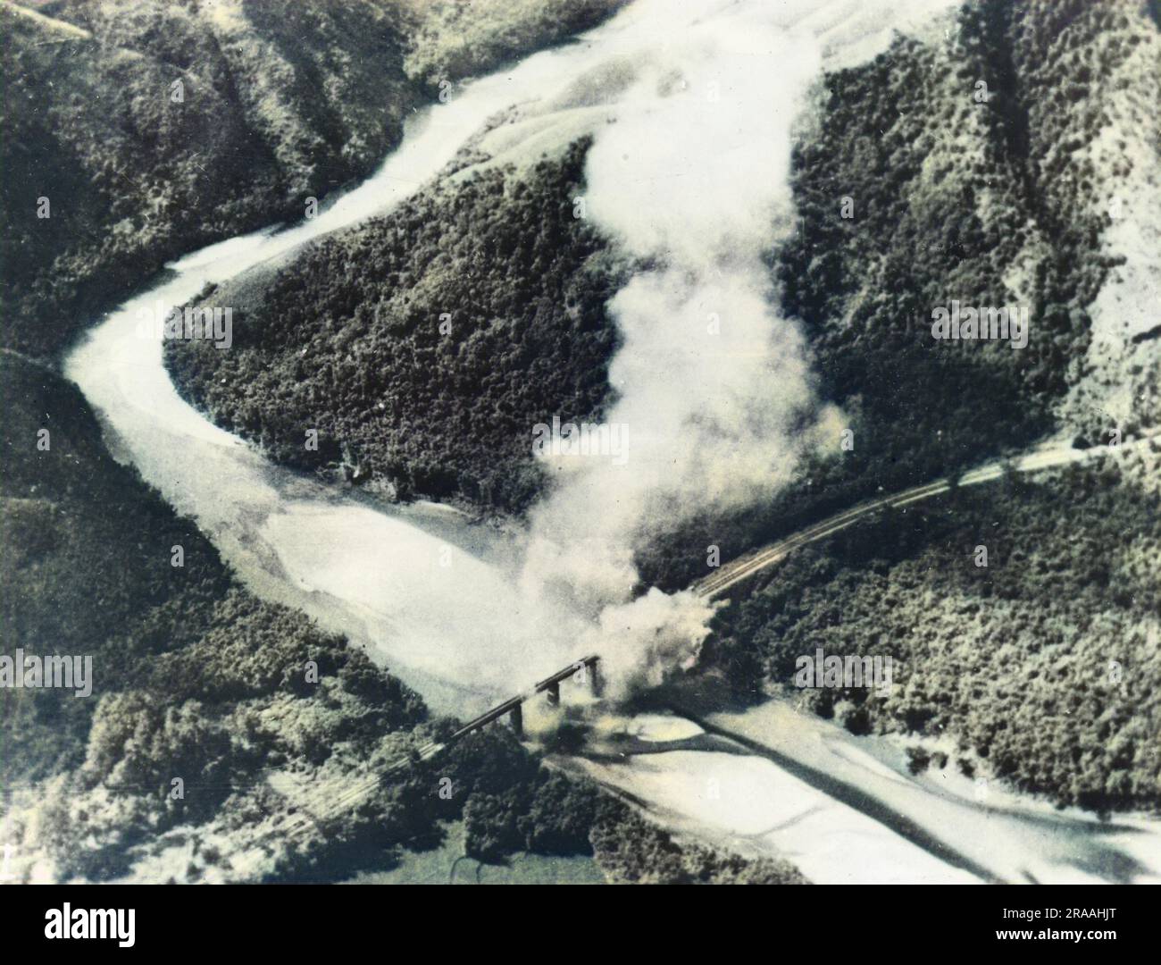 A bridge near Canton is bombed by Japanese aircraft. The bridge carried the railway from Canton to Wuchang, near Nanking.     Date: Nov-37 Stock Photo
