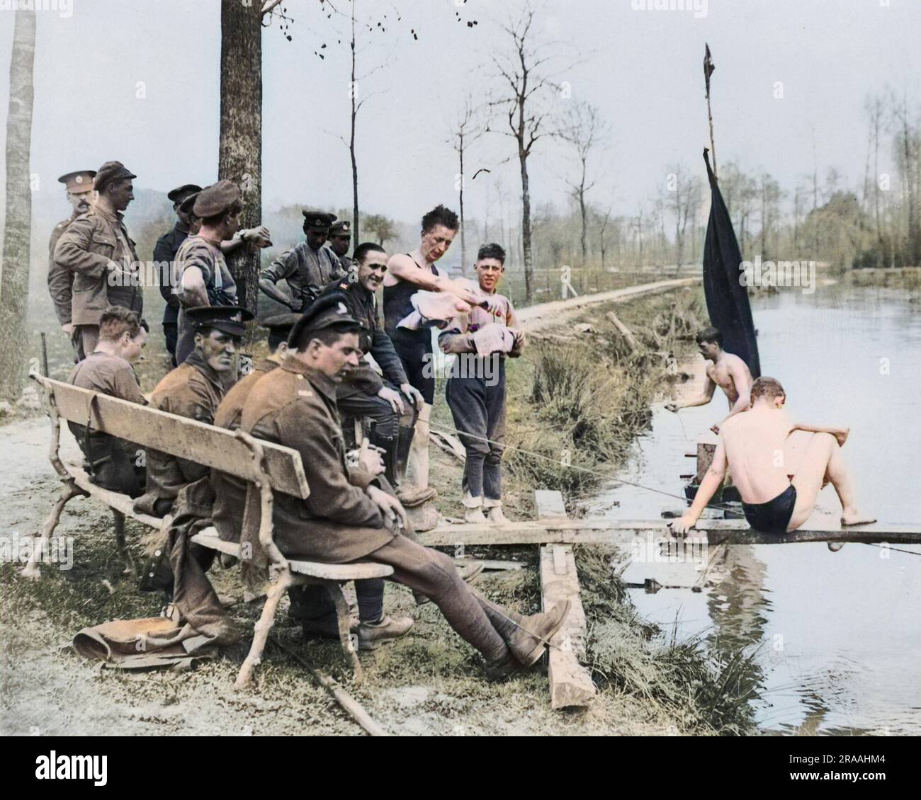 British soldiers relaxing and swimming during a break in fighting, on the Western Front during World War One.     Date: circa 1916 Stock Photo