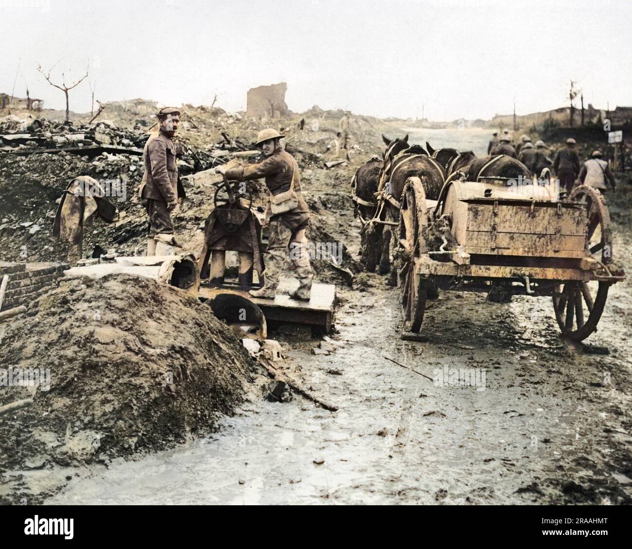 British soldiers drawing water in a captured village on the Western Front during World War One.     Date: circa 1916 Stock Photo