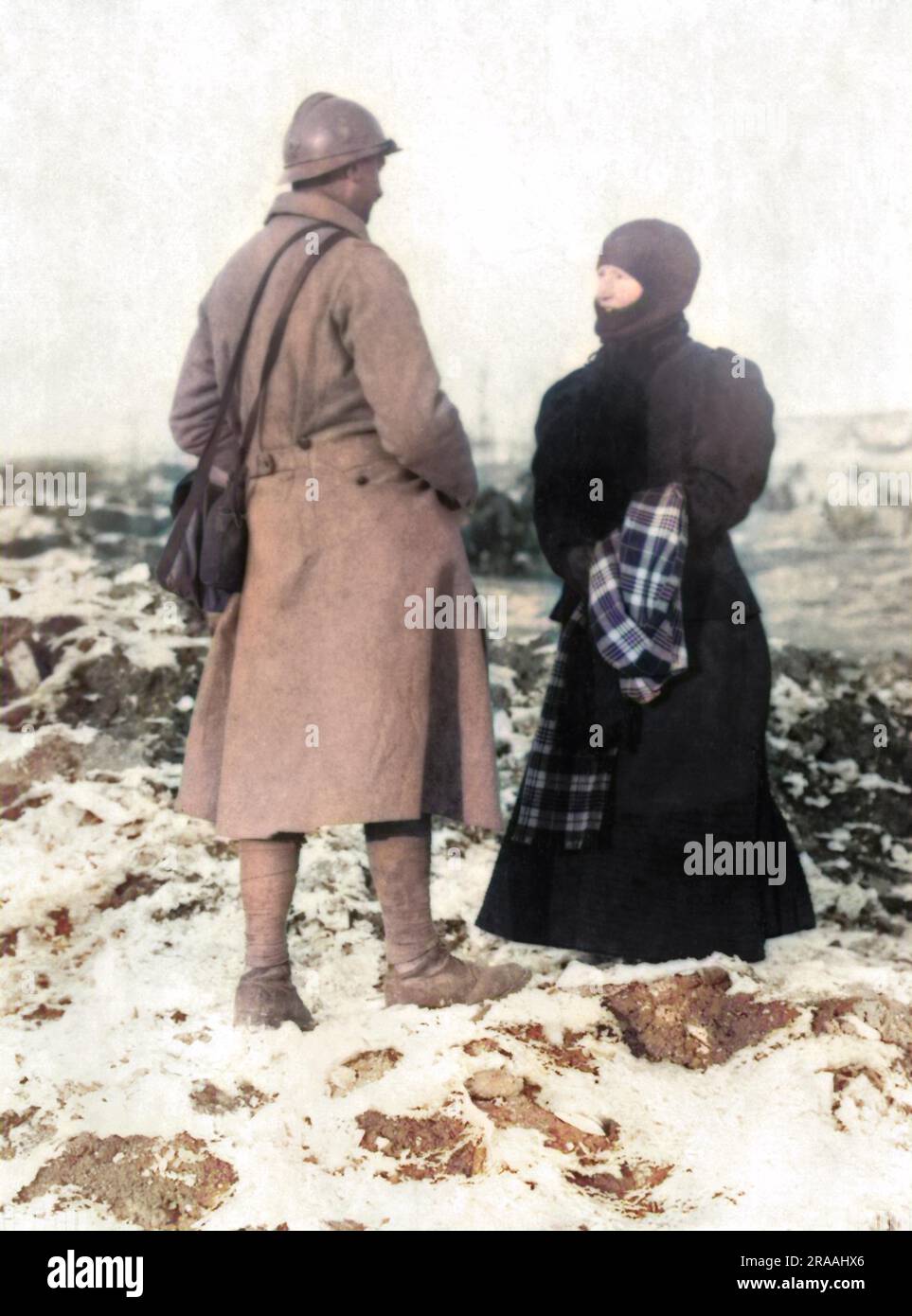 A French soldier and his wife who returned to their formerly captured village on the Western Front during World War One.  They were seeking the money which they buried before the invasion.     Date: circa 1916 Stock Photo