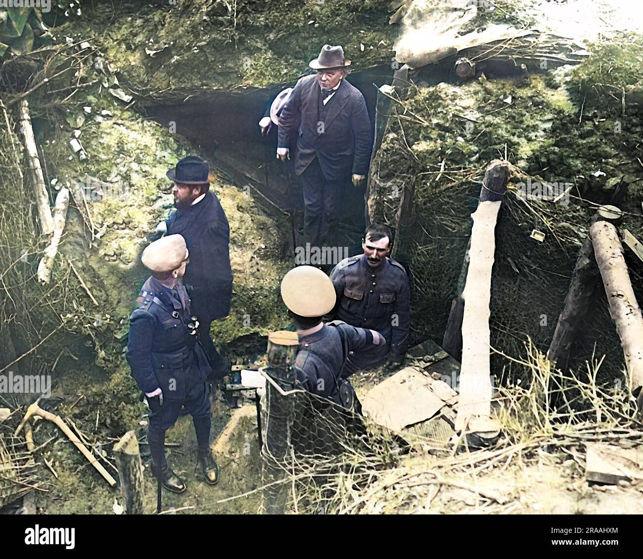 Lloyd George and M. Albert Thomas (French Minister for Munitions) emerging from a captured German dugout on the Western Front in France during World War One.     Date: circa 1916 Stock Photo