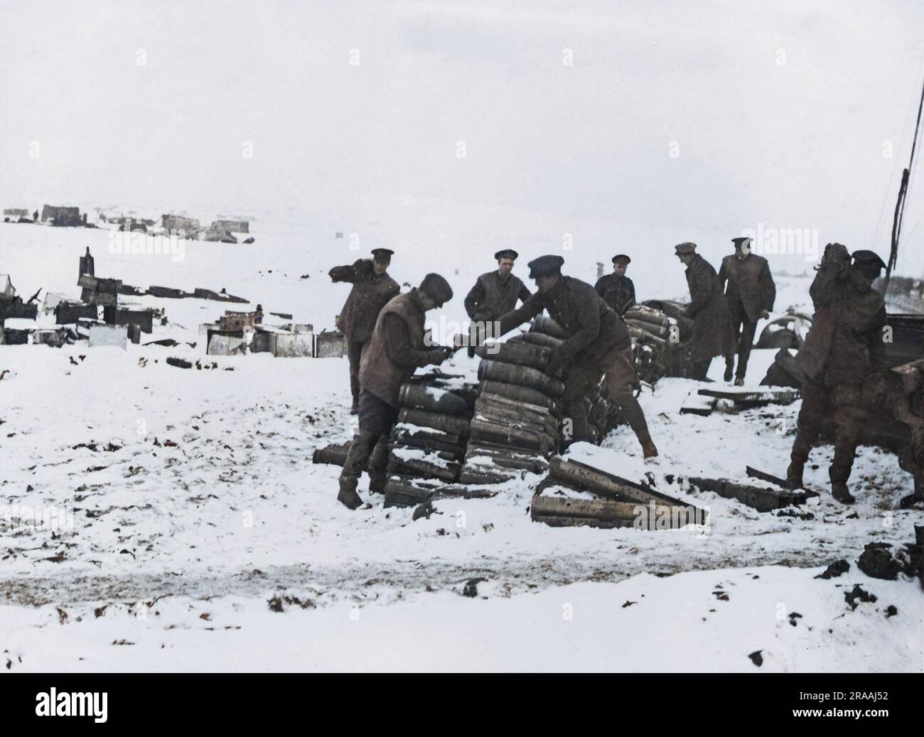 British artillerymen sorting shells in the snow on the Western Front during World War One.     Date: circa 1916 Stock Photo