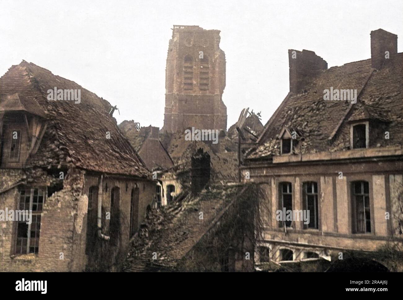 View of the church tower and other damaged buildings at Bethune on the Western Front in France during World War One.     Date: circa 1918 Stock Photo