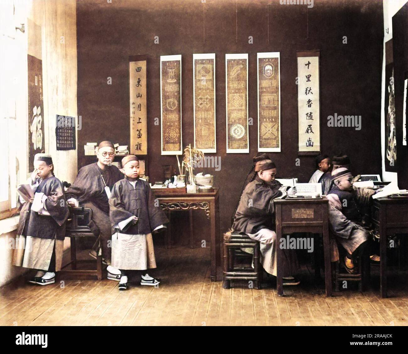 Boys and teacher in a schoolroom, China. Date: circa 1890 Stock Photo ...
