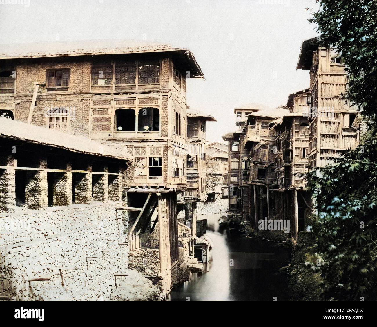 Merchants' houses on the Marqual Canal, Srinagar, Kashmir, India.     Date: circa 1890s Stock Photo