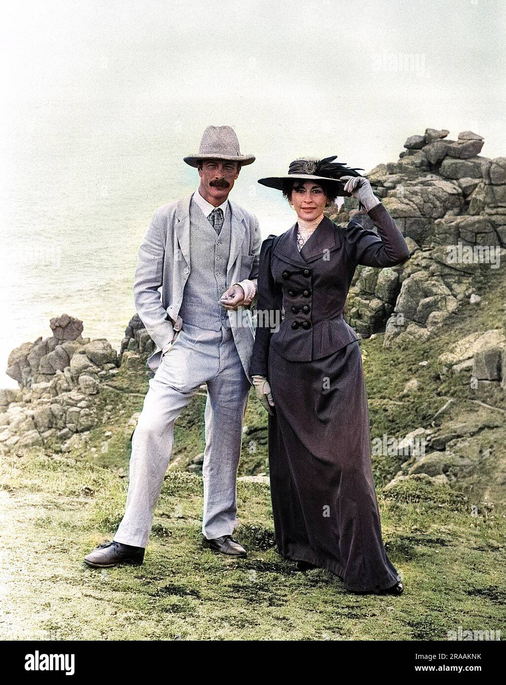 The actress Nanette Newman on location near Land's End, Cornwall, with the actor Michael Culver, in the roles of the Newlyn School artists Stanhope Alexander Forbes (1857-1947) and Elizabeth Adela Stanhope Forbes (nee Armstrong, 1859-1912), in A Breath of Fresh Air, a TSW (Television South West) production.     Date: circa 1984 Stock Photo