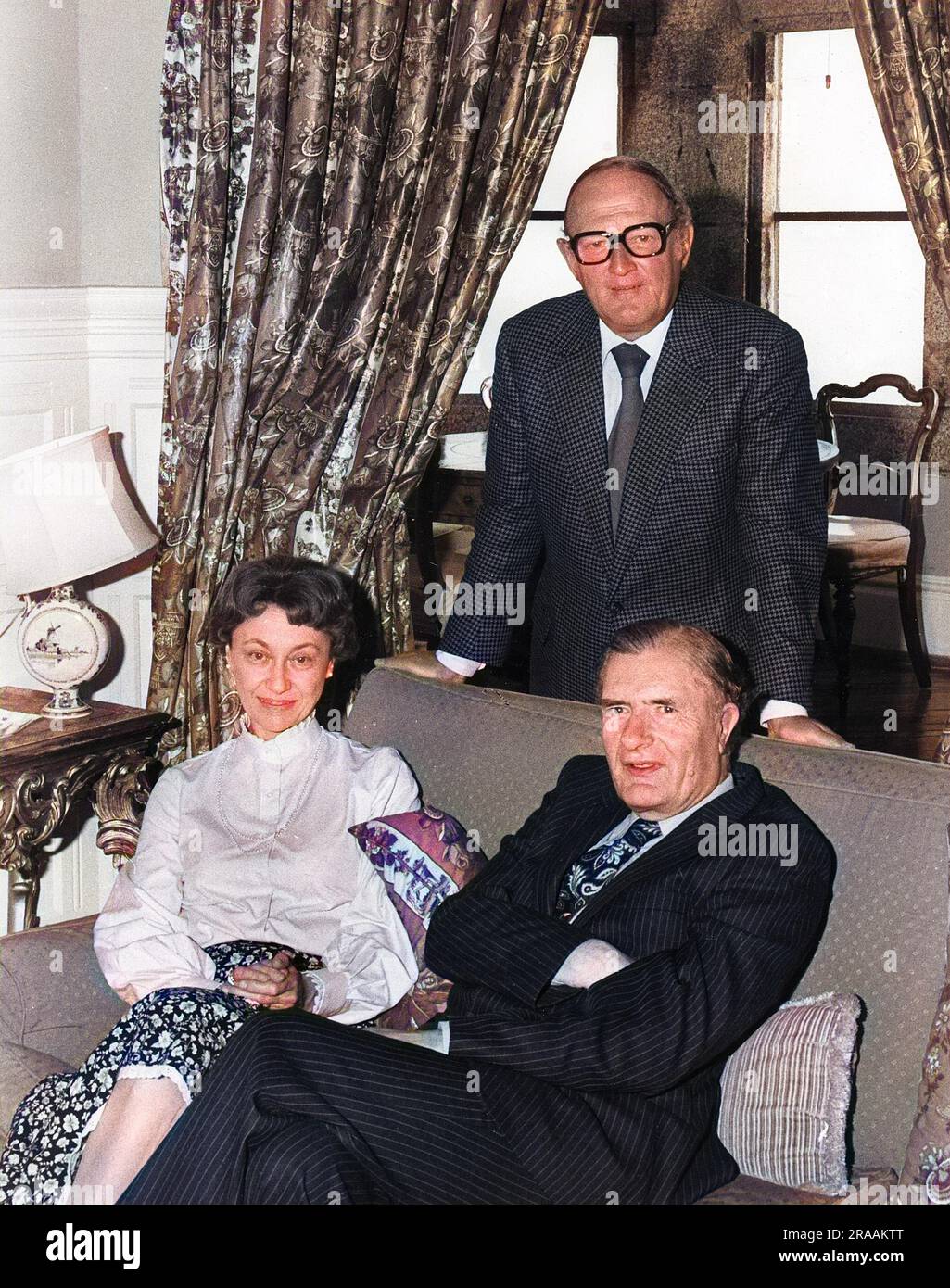 Robert Robinson (1927-2011), radio and TV presenter, journalist and author, with Lord John Francis Arthur St Aubyn, 4th Baron St Levan (1919-2013), and his wife Lady Susan St Levan (d 2003), at their home on St Michael's Mount, Cornwall.     Date: circa 1970s Stock Photo