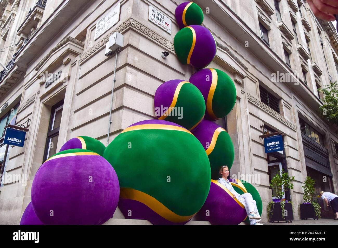 London, UK. 2nd July 2023. Giant Wimbledonthemed tennis balls decorate