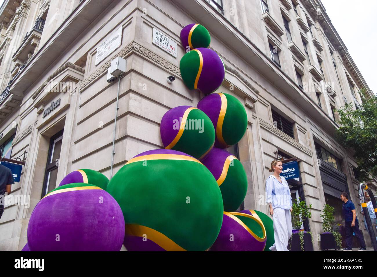 London, UK. 2nd July 2023. Giant Wimbledonthemed tennis balls decorate