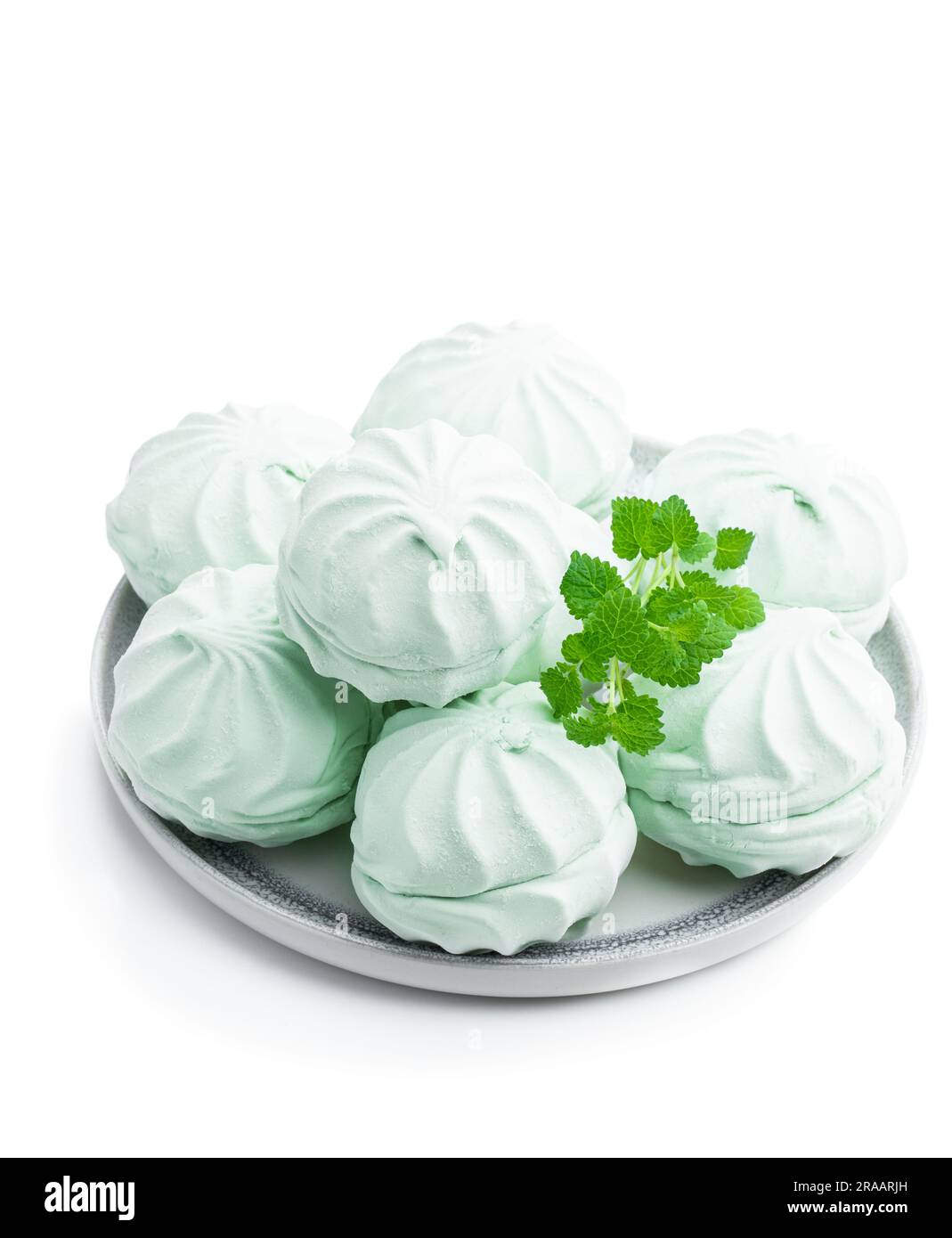 Mint  marshmallows on ceramic plate isolated on white Stock Photo